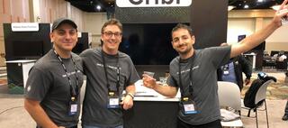 group of people smiling in front of Cribl installation